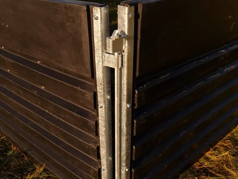 Close up of hurdle metal ends and locking pins