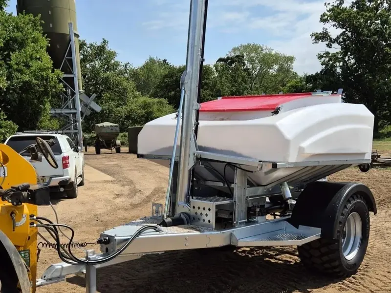 3T Easy-Feed trailer being pulled by tractor