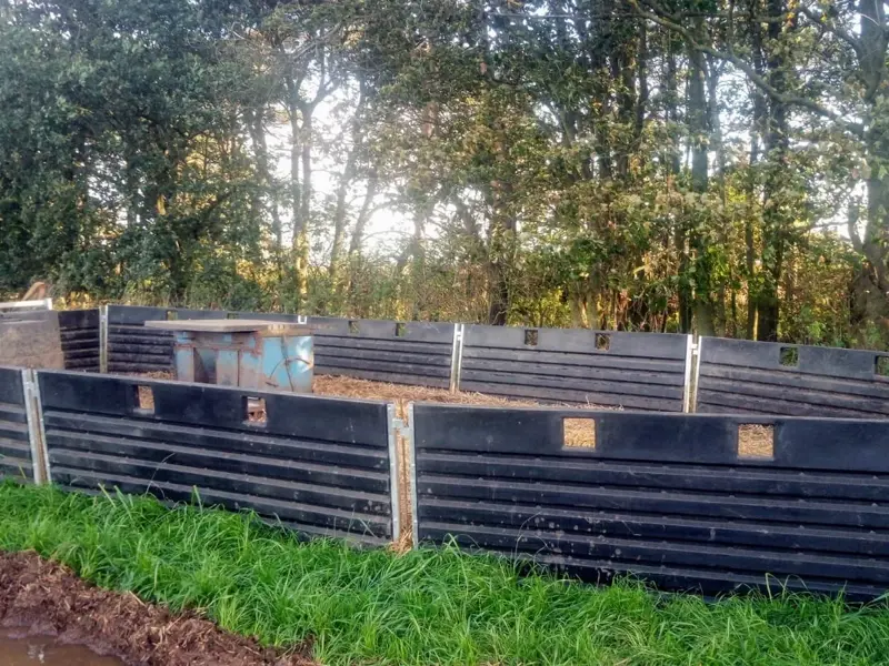 Hurdles set up with weaner hut